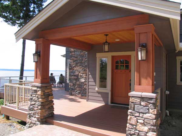 Entry to newly built custom craftsman home with stone and fine woodworking.
